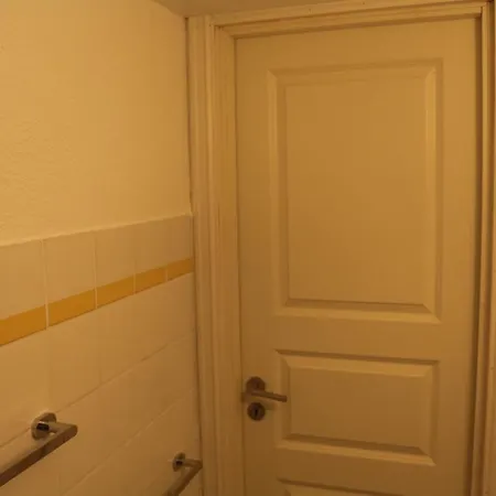 With1 Bedroom Separate Living With A Sofa Bed And A Tiny Kitchen A Bathroom Located In Nordstrand Near By The Sea For 3 Guests With A Garden And Grill 5 Extra Guests With Extra Cost In The With Sea View Just Outside The Apar Apartment *