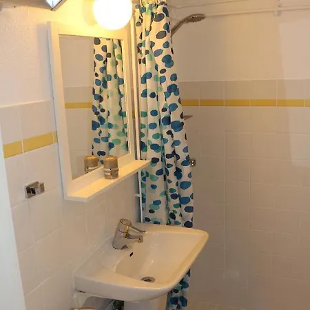 Apartamento With1 Bedroom Separate Living With A Sofa Bed And A Tiny Kitchen A Bathroom Located In Nordstrand Near By The Sea For 3 Guests With A Garden And Grill With Sea View Just Outside The