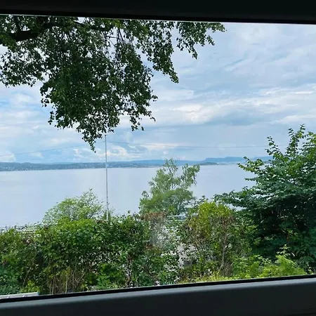 With1 Bedroom Separate Living With A Sofa Bed And A Tiny Kitchen A Bathroom Located In Nordstrand Near By The Sea For 3 Guests With A Garden And Grill 5 Extra Guests With Extra Cost In The With Sea View Just Outside The Apar *