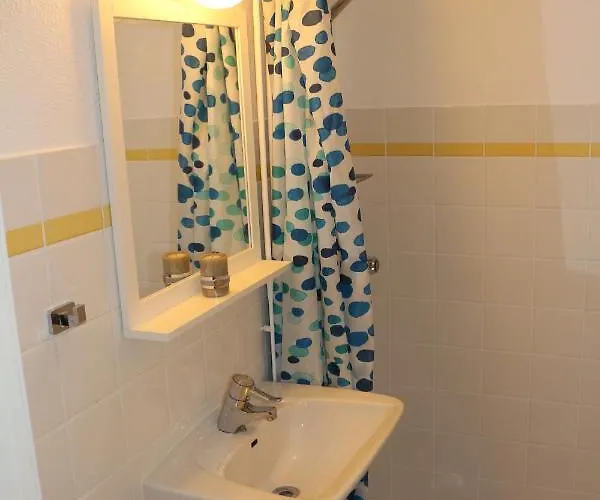 Apartmán With1 Bedroom Separate Living With A Sofa Bed And A Tiny Kitchen A Bathroom Located In Nordstrand Near By The Sea For 3 Guests With A Garden And Grill With Sea View Just Outside The